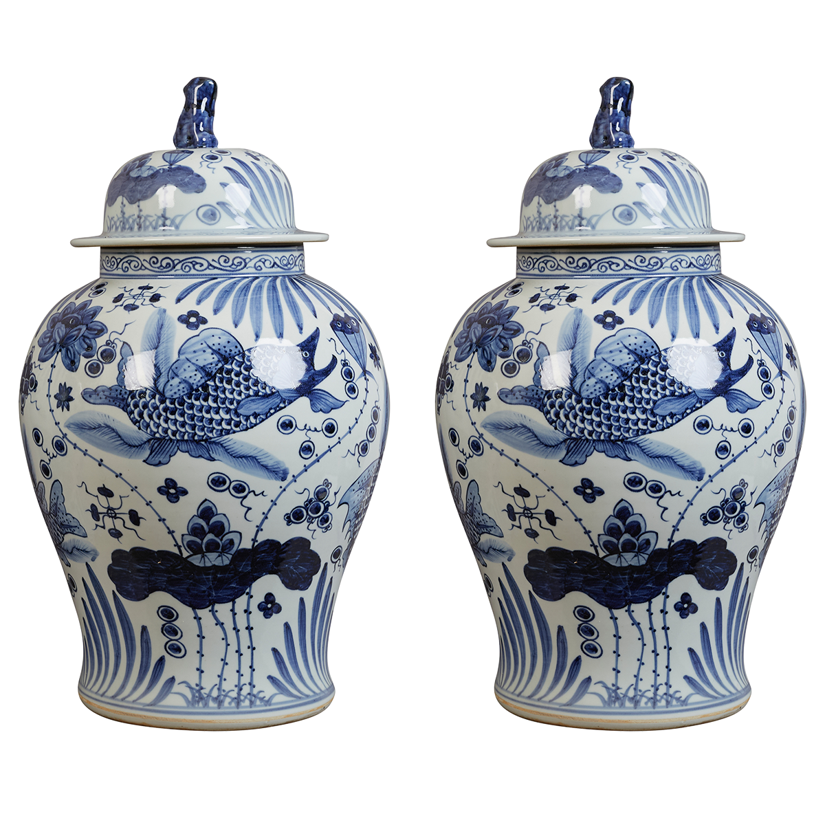 A pair of contemporary blue and white Chinesse jars, decorated with playful fish swimming among stylised aquatic plants and floral motifs