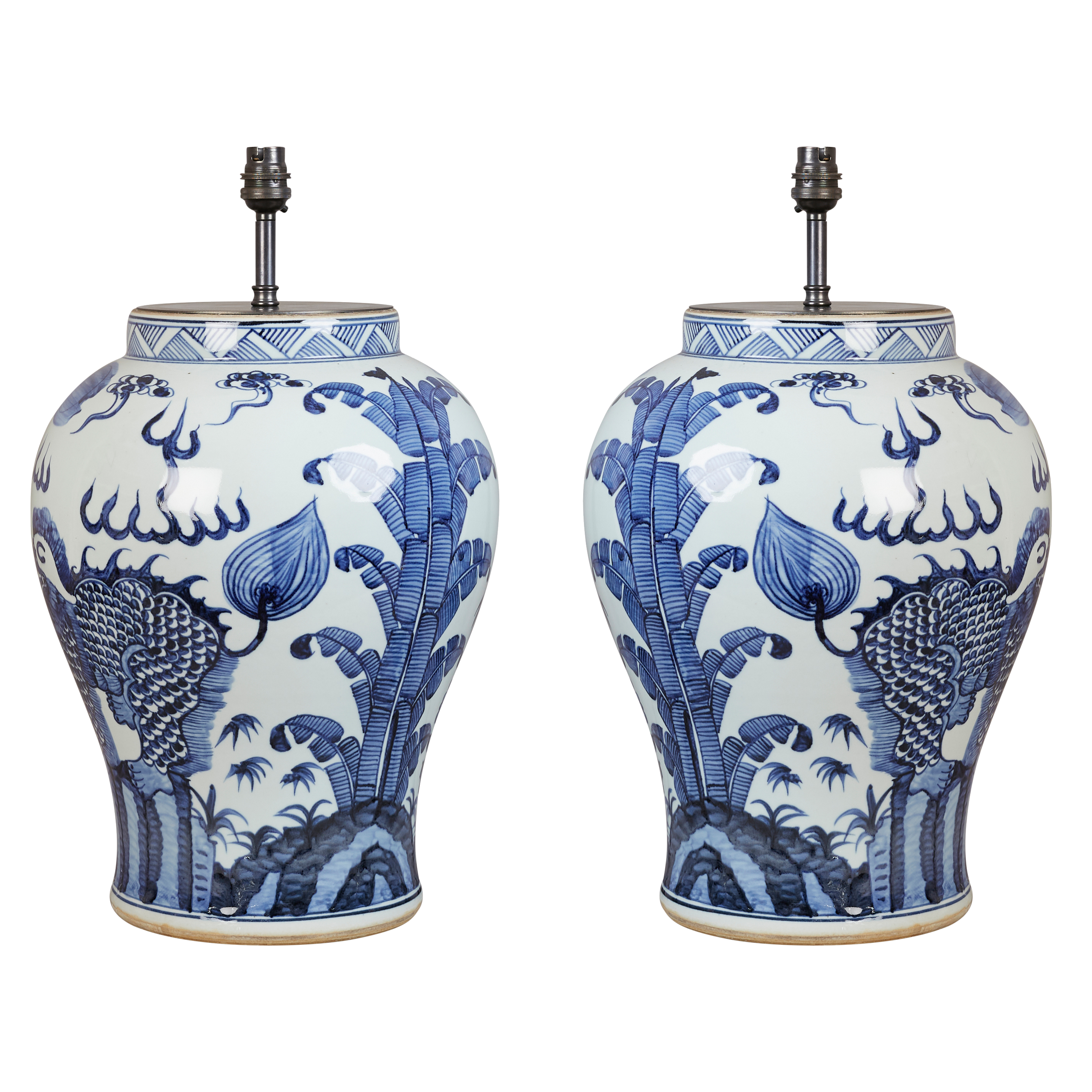 A pair of contemporary blue and white Chinese-style lidded jars with stylised phoenix birds