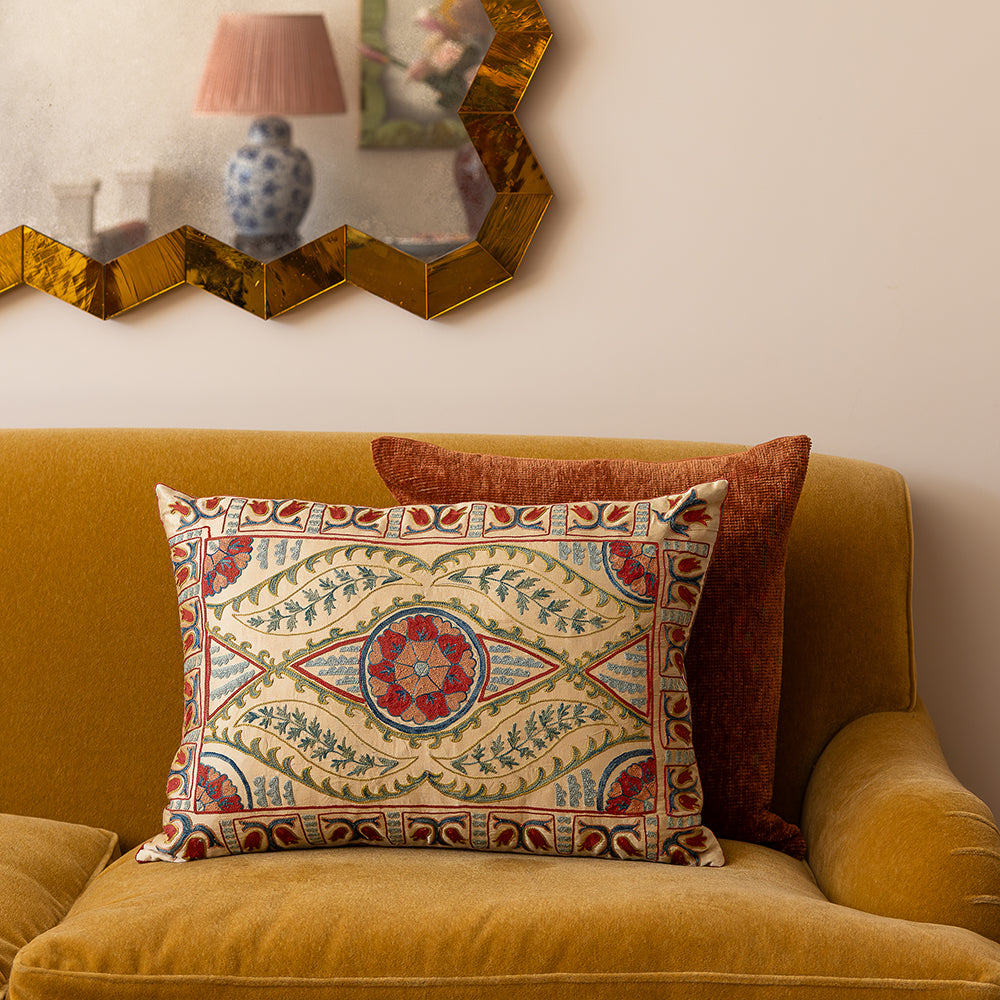 Rectangular silk suzani embroidered cushion with central medallion design and border