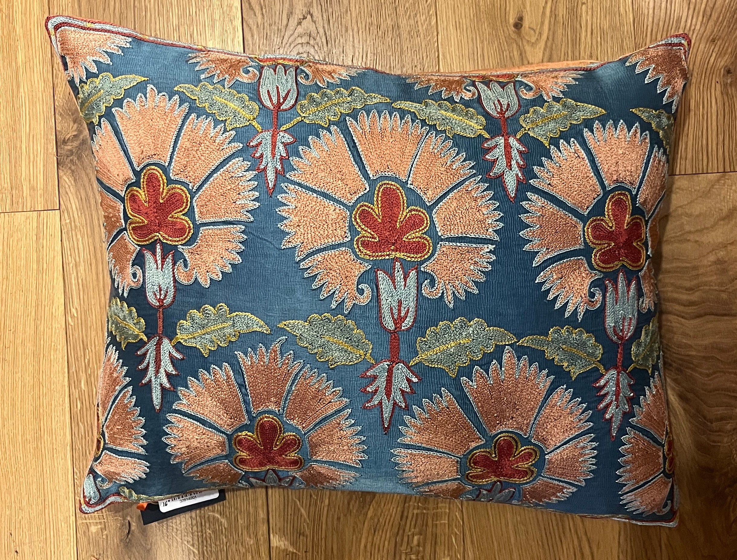 Rectangular silk suzani cushion with carnation design on blue ground