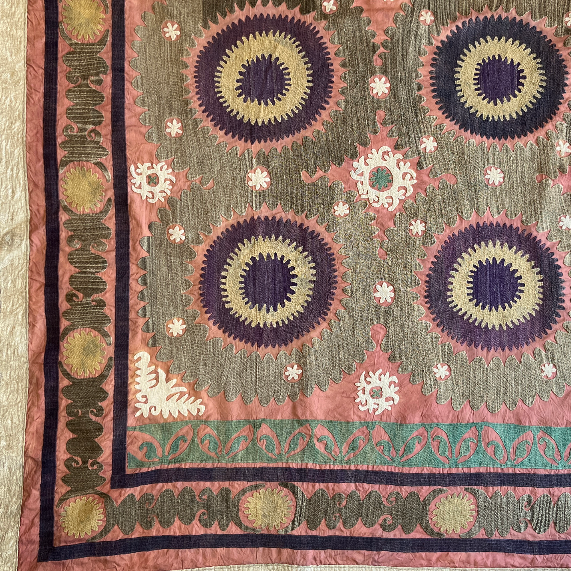 Large olive green and pink cotton suzani hanging/bedspread, Uzbekistan circa 2000