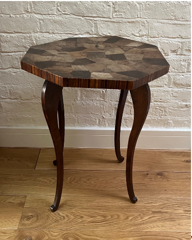 A late 19th century pine and specimen wood top table