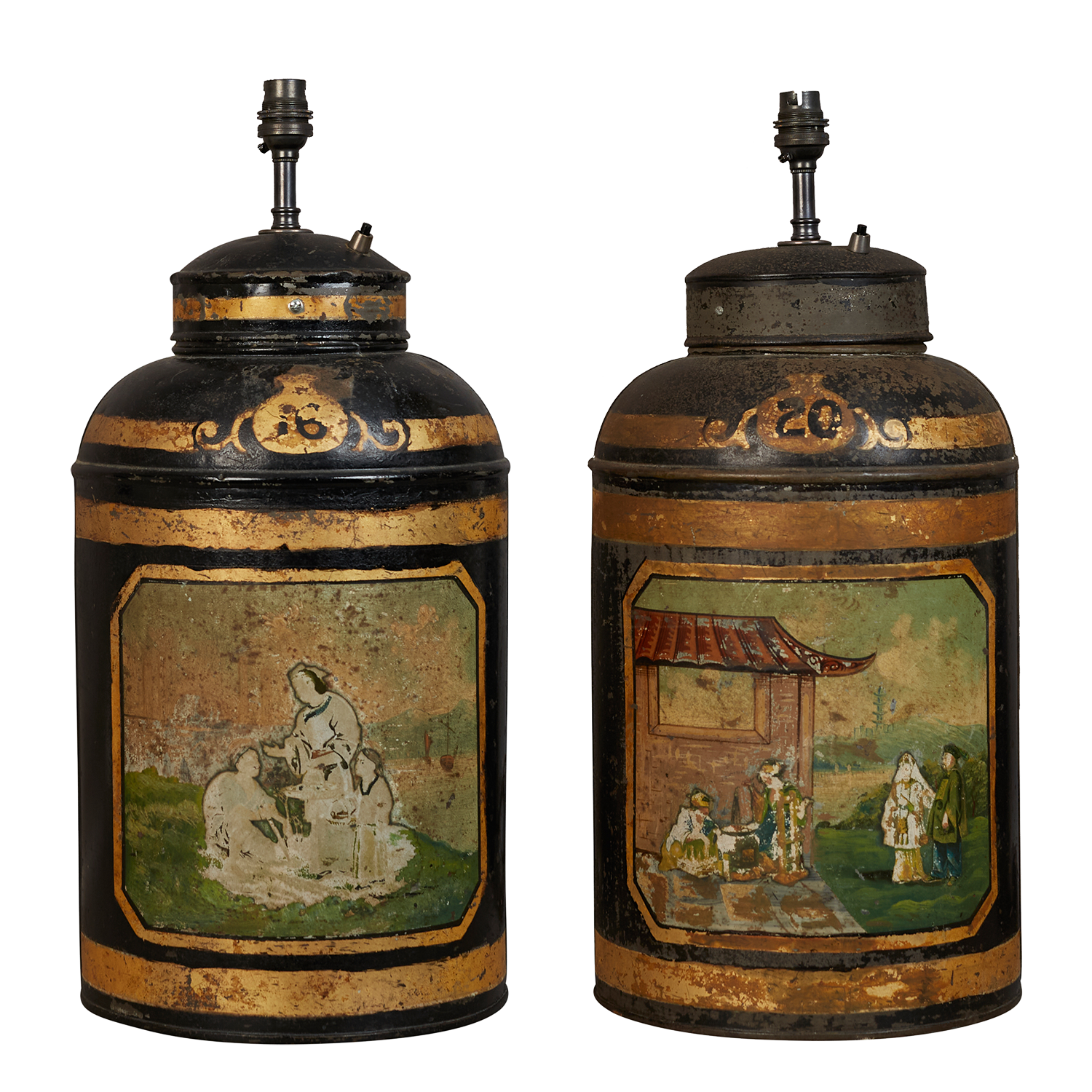 A pair of mid 20th century toleware decorated canister table lamps, electrified