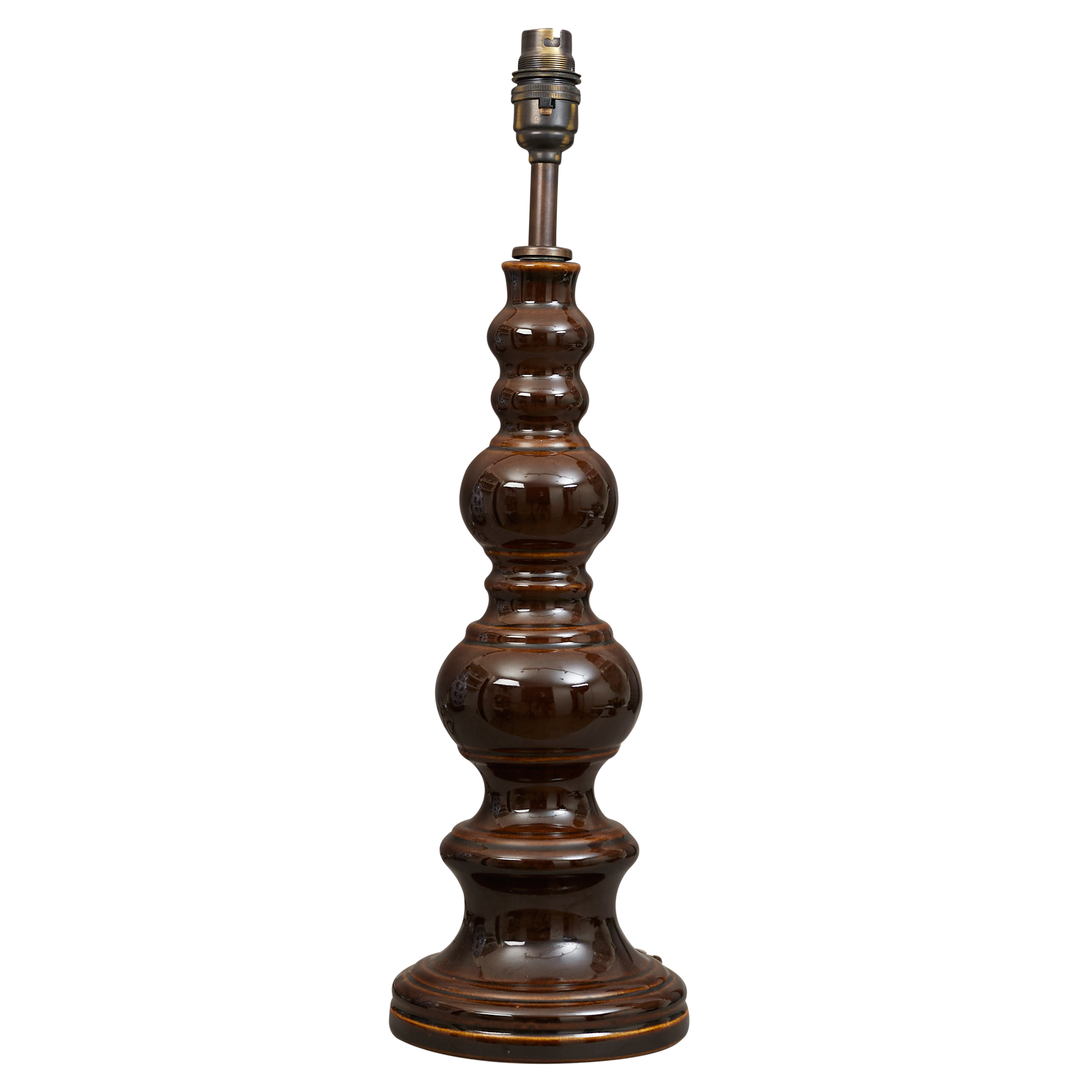 A mid 20th century glazed ceramic bobbin table lamp