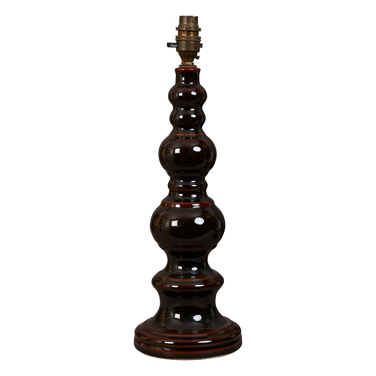 A mid 20th century glazed ceramic bobbin table lamp, not electrified