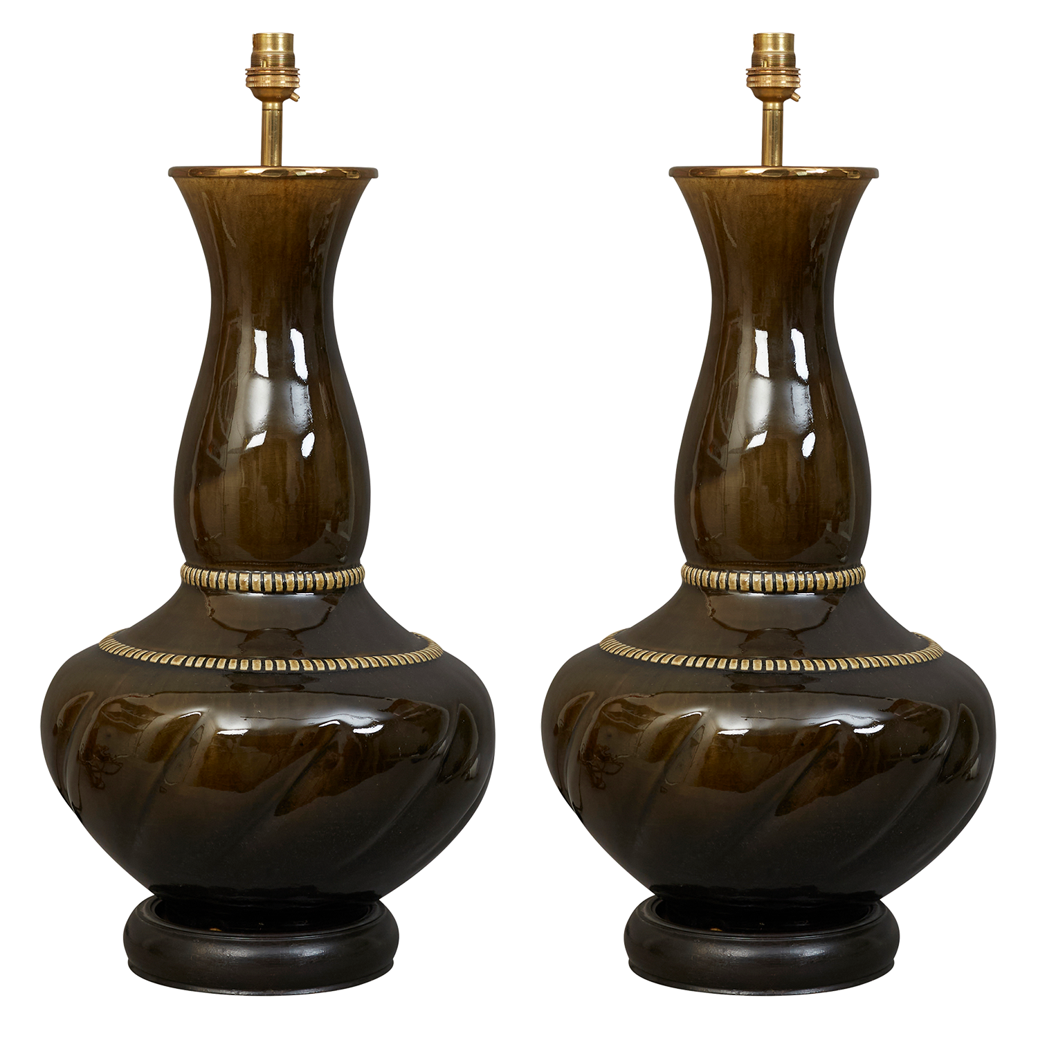 A pair of 20th century glazed brown pottery lamps