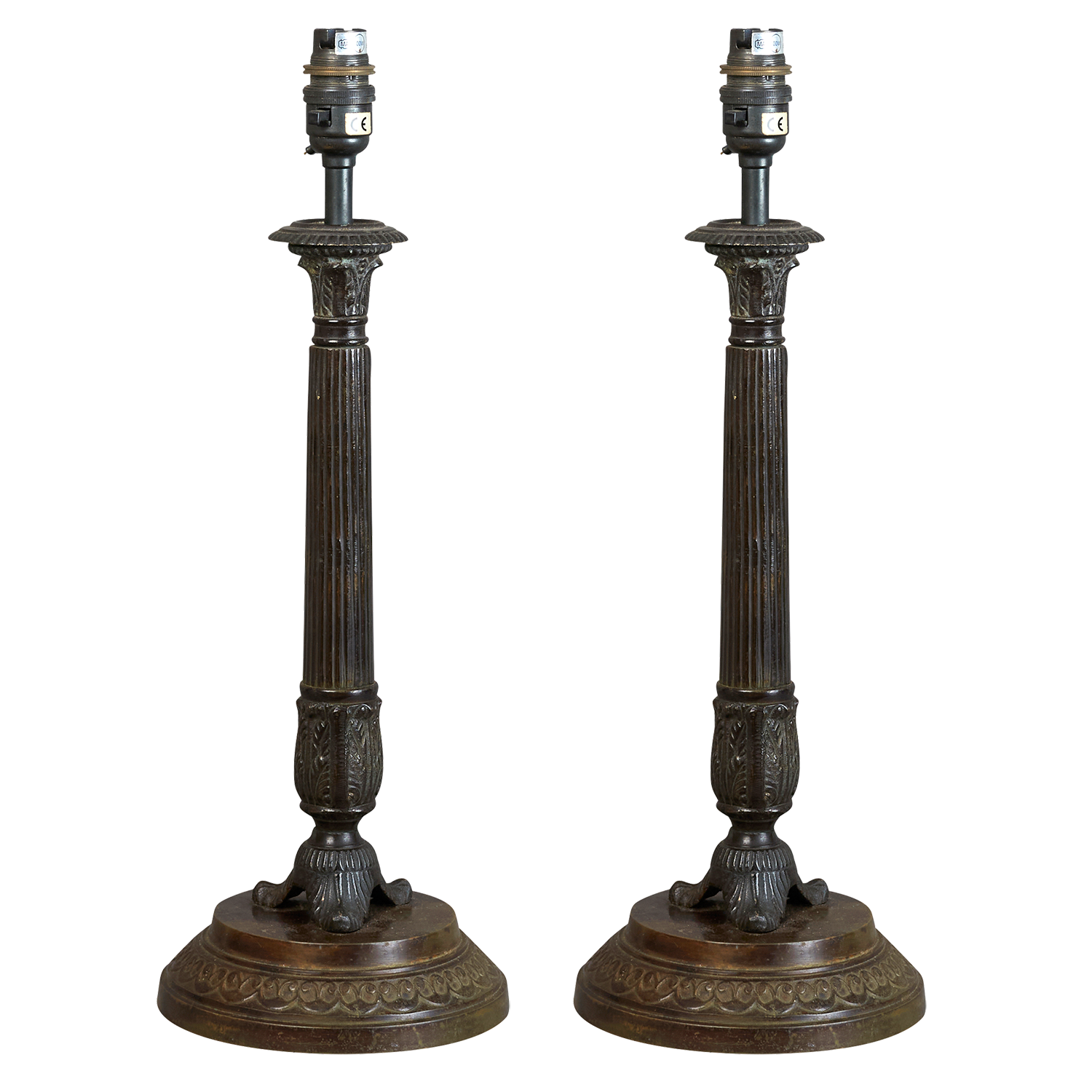 A pair of 20th century Regency style patinated bronze lamps
