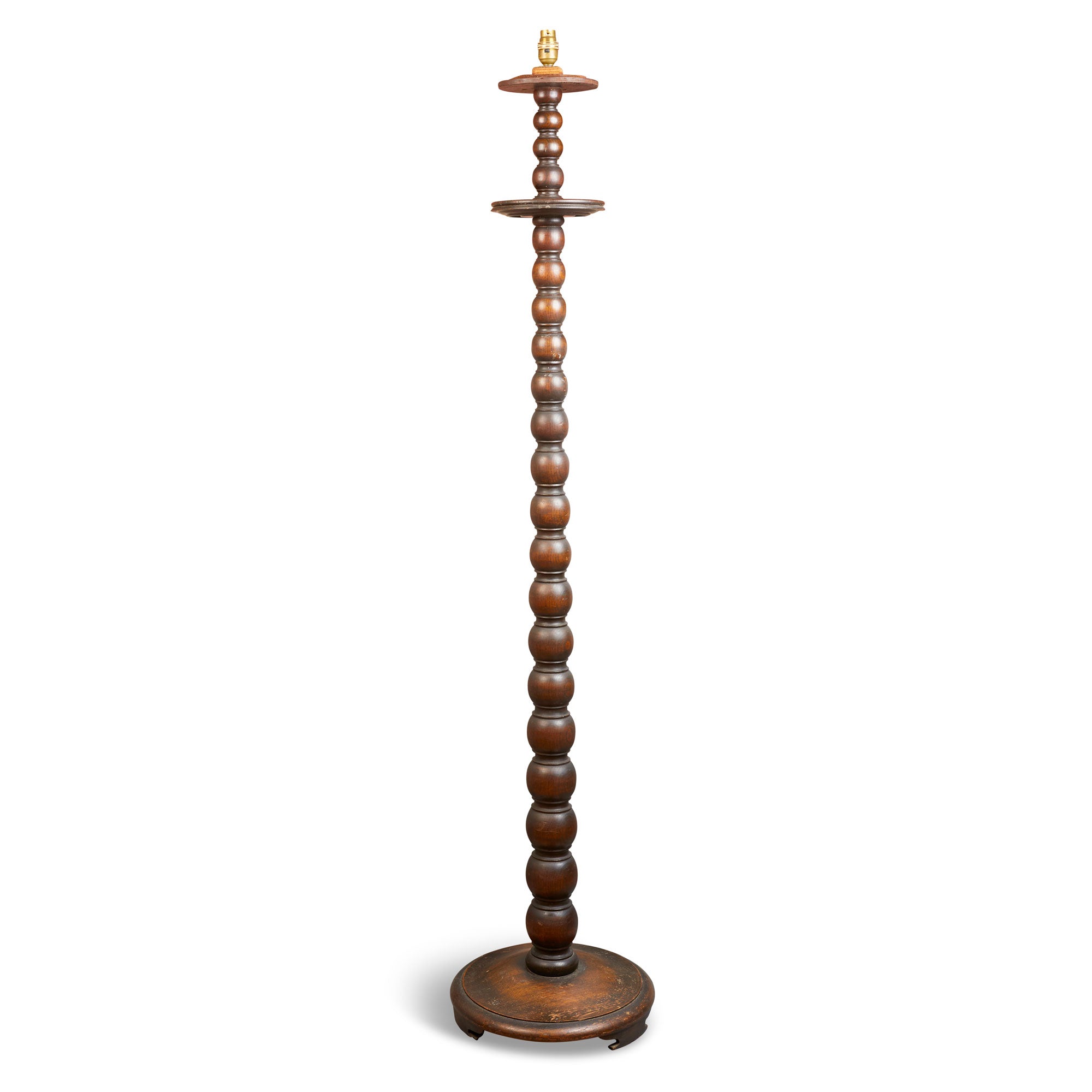 A late 20th century oak bobbin standard lamp