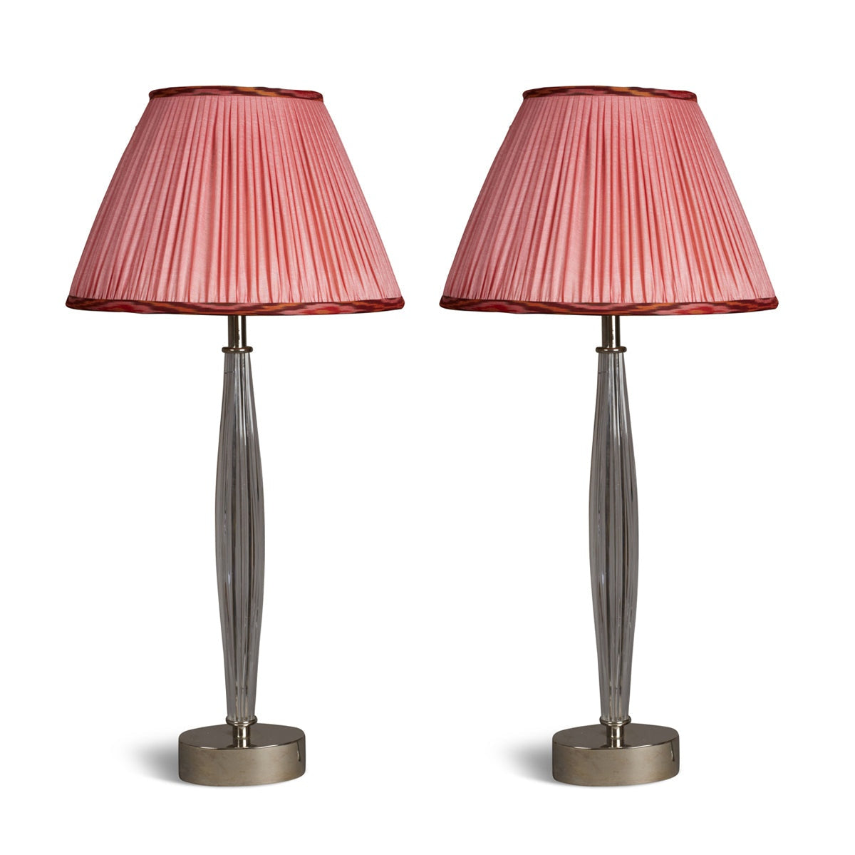 Nushka Lighting A pair of 20th Century glass column lamps on nickel plated oval bases