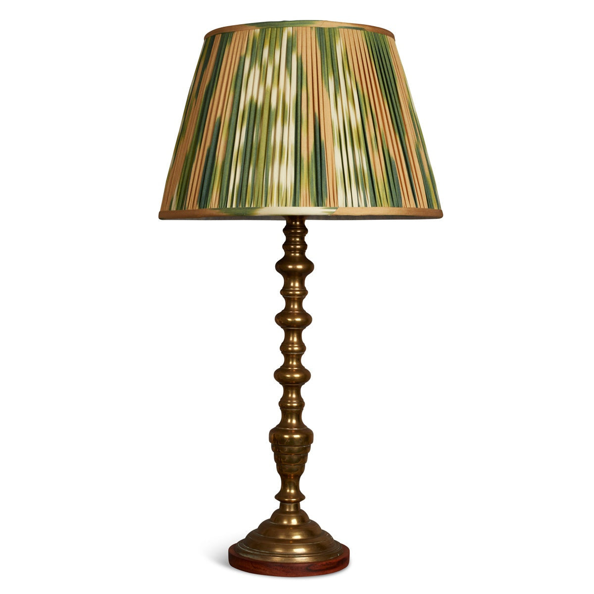 Nushka Lighting An early 20th century brass turned lamp on wooden base