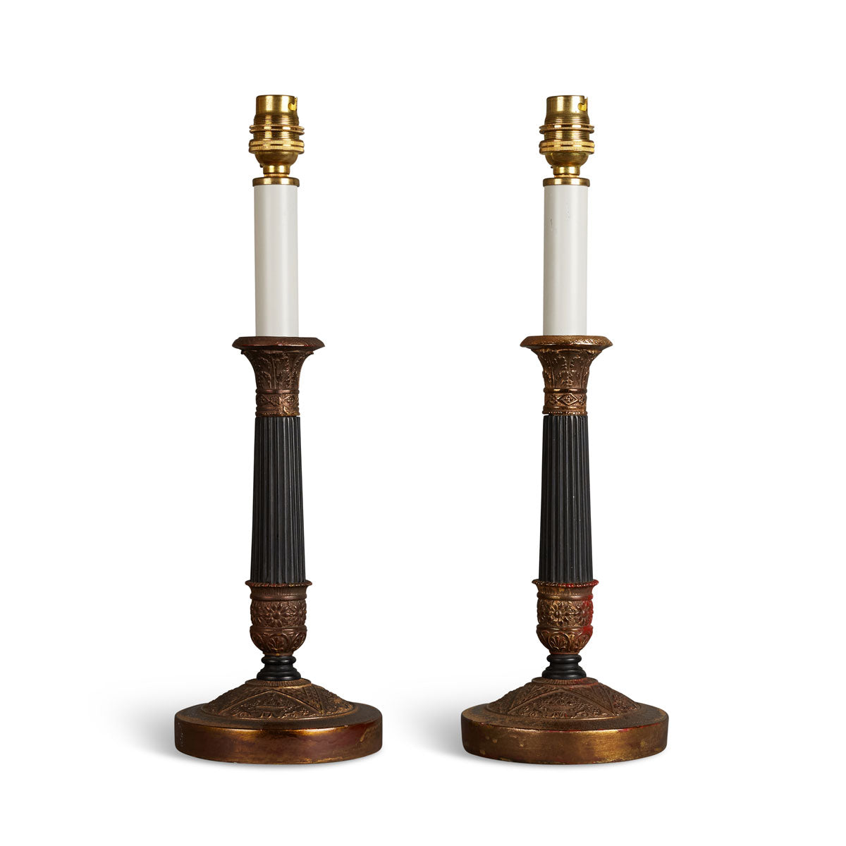 Nushka Lighting Pair of Charles X style gilt metal and ebonised table lamps