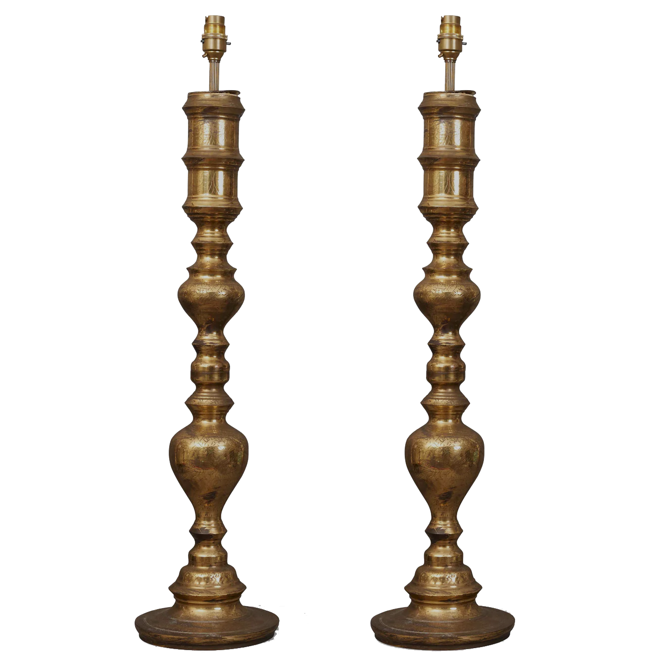 A pair of Indian brass engraved table lamps